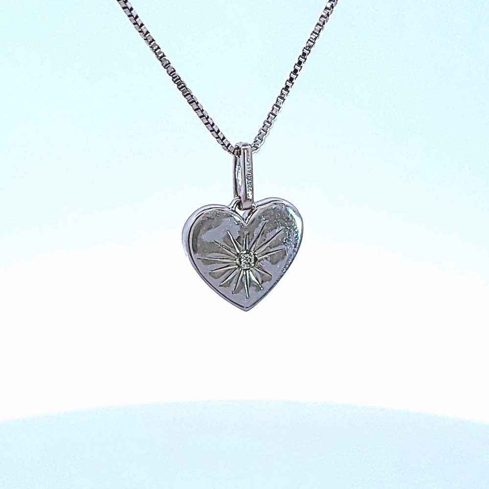 .01ct. Diamond Heart Pendant in Sterling Silver