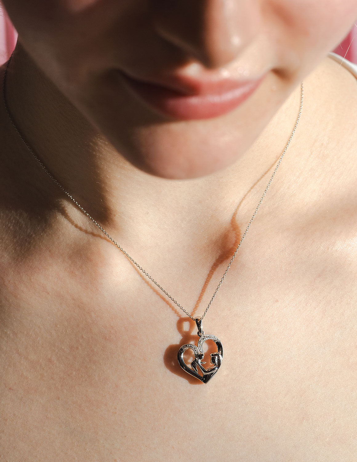 .02ct. t.w. Diamond Heart Pendant in Sterling Silver