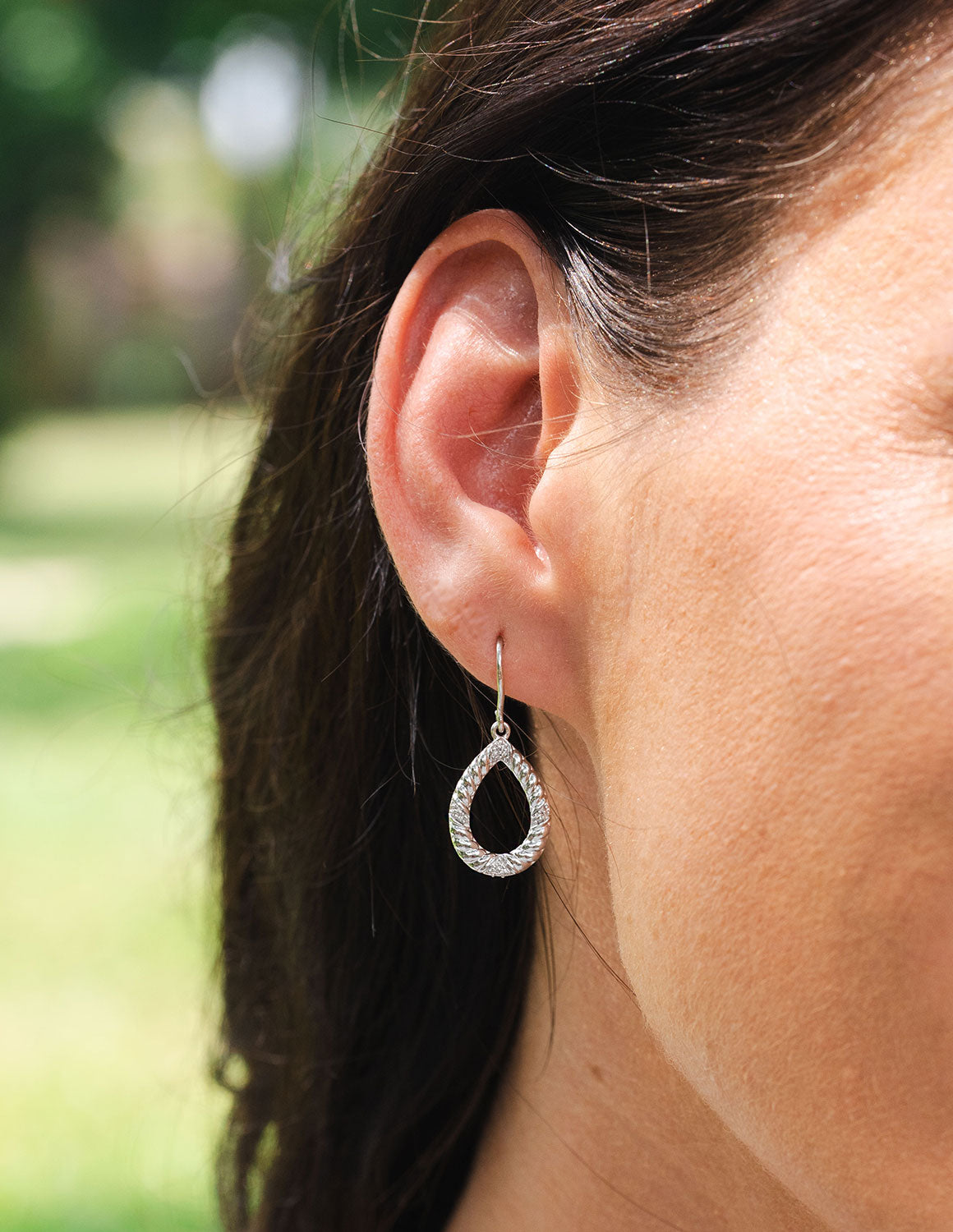 .05ct. t.w. Diamond Pear Earrings in Sterling Silver