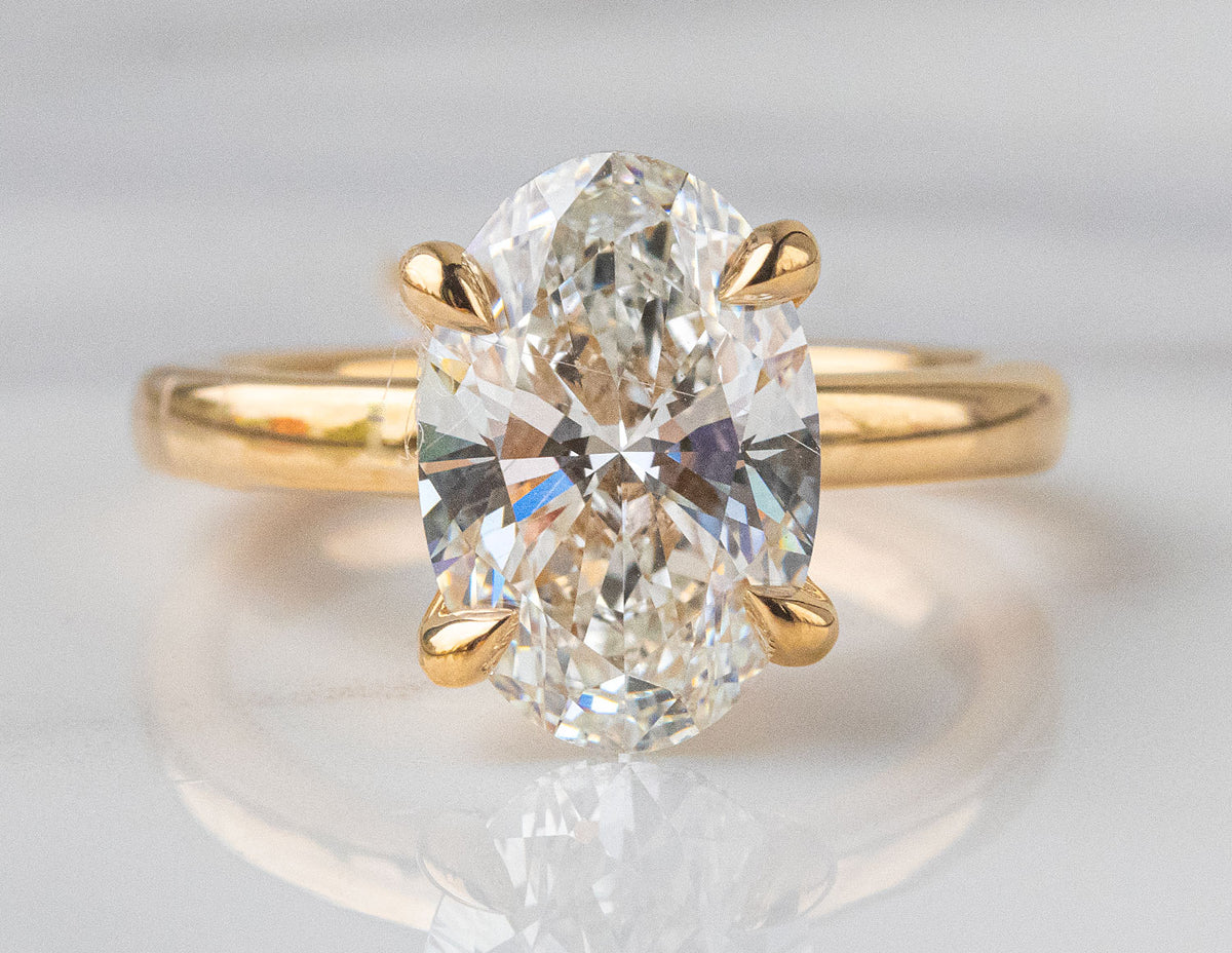 4ct. Oval Cut Newborn Lab Created Solitaire Diamond Engagement Ring in 14K Yellow Gold