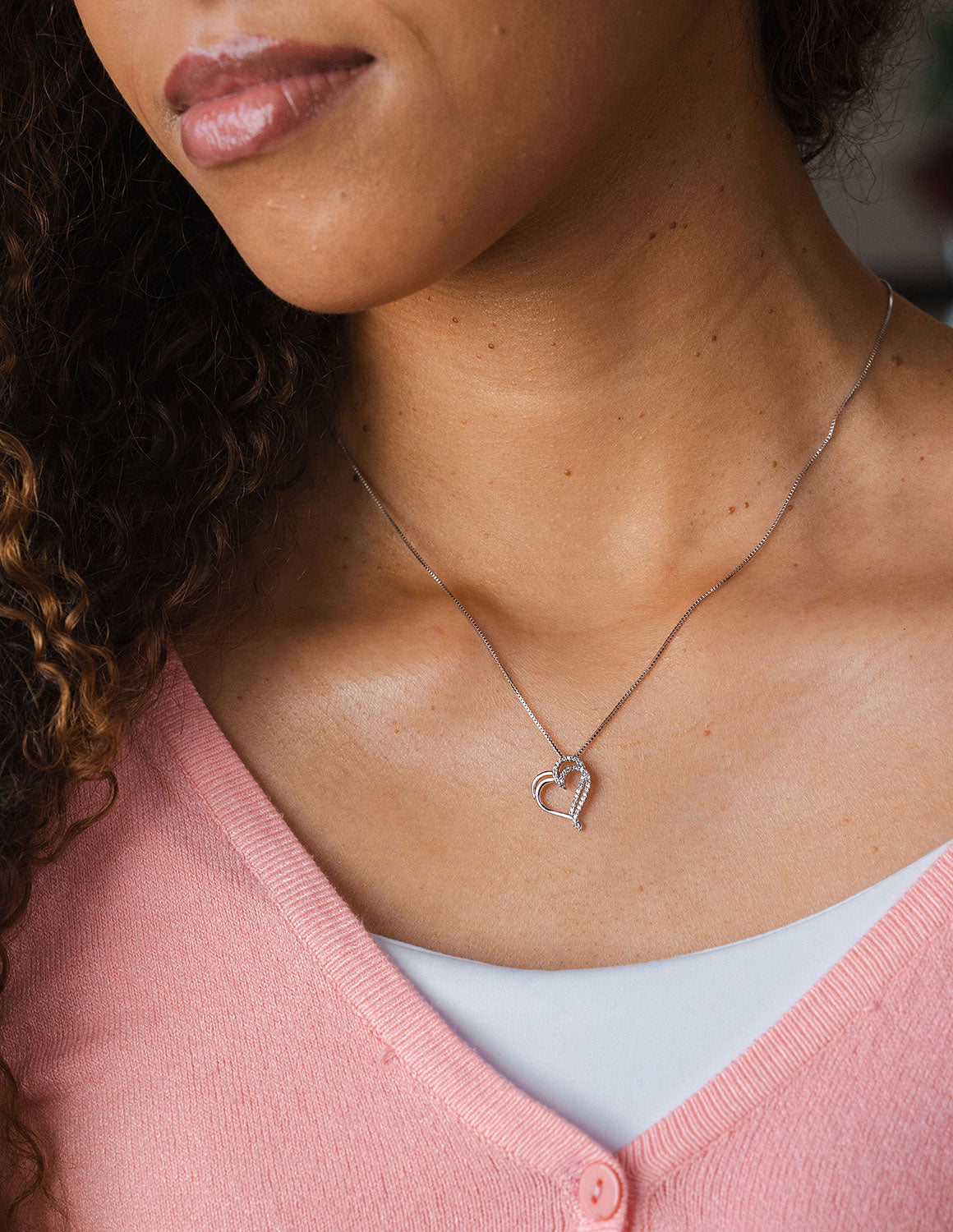 1/10ct. t.w. Diamond Heart Pendant in Sterling Silver