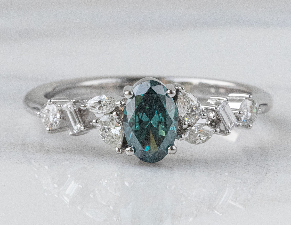 3/4ct. t.w. Oval Cut Blue and White Diamond Ring in 14K White Gold