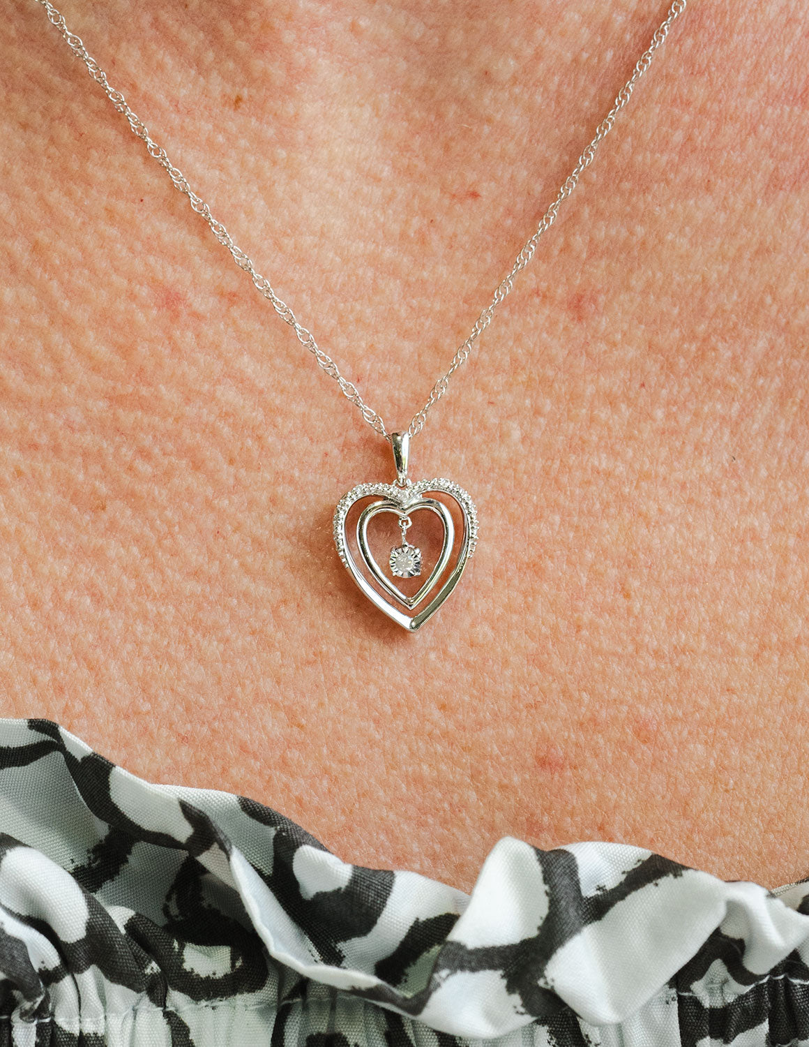 .03ct. t.w. Round Cut Shimmering Diamond Heart Pendant in Sterling Silver
