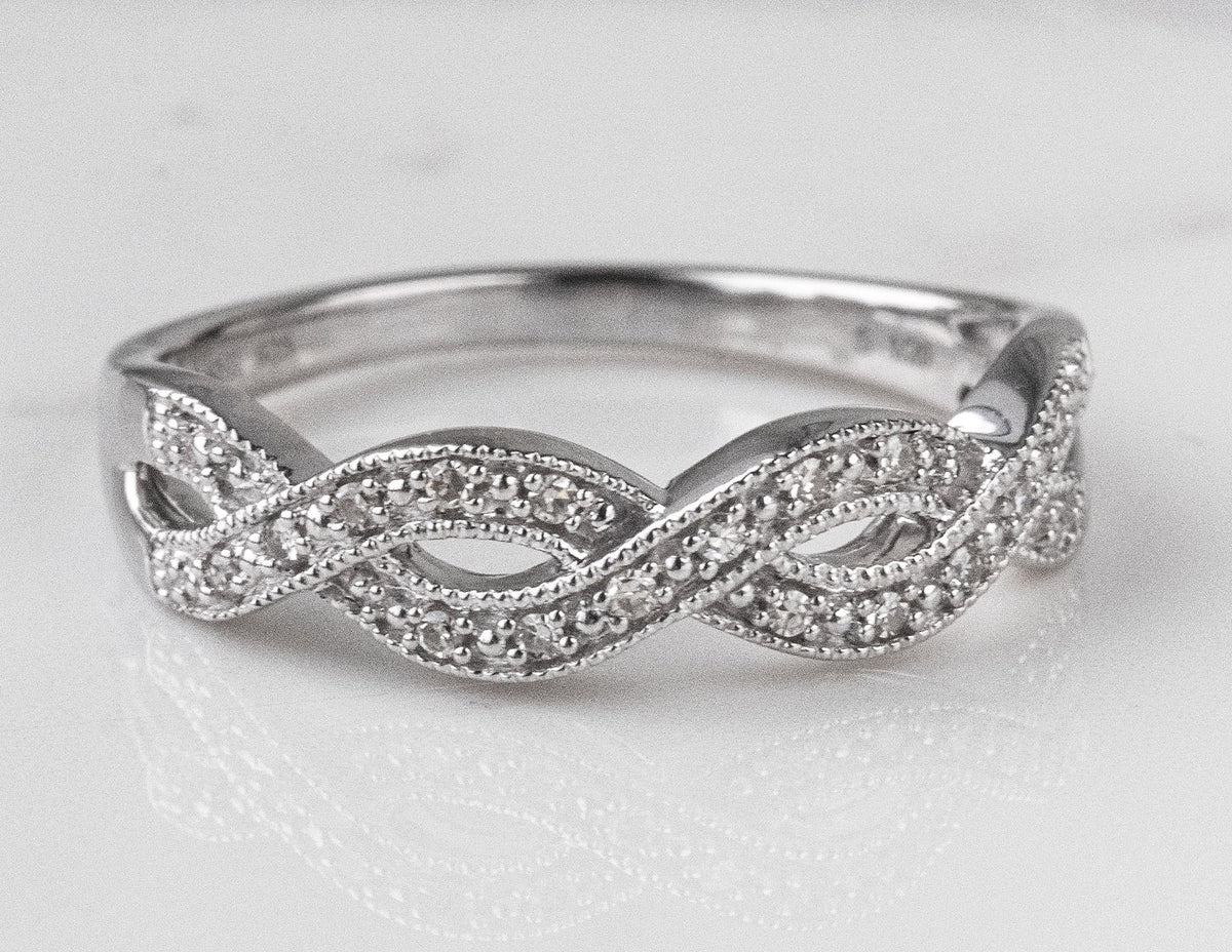 1/14ct. t.w. Diamond Infinity Ring in Sterling Silver