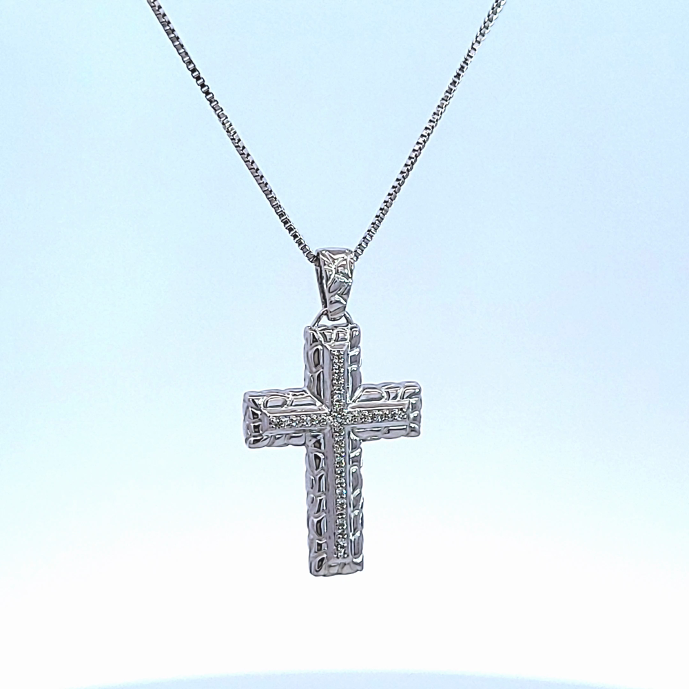 1/10ct. t.w. Diamond Cross Pendant in Sterling Silver