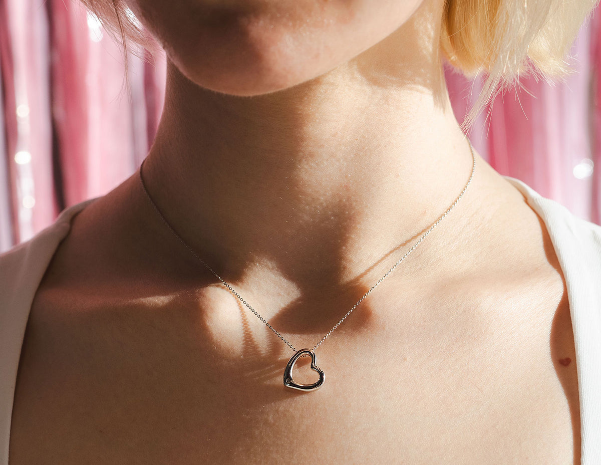 .01ct. Diamond Heart Pendant in Sterling Silver