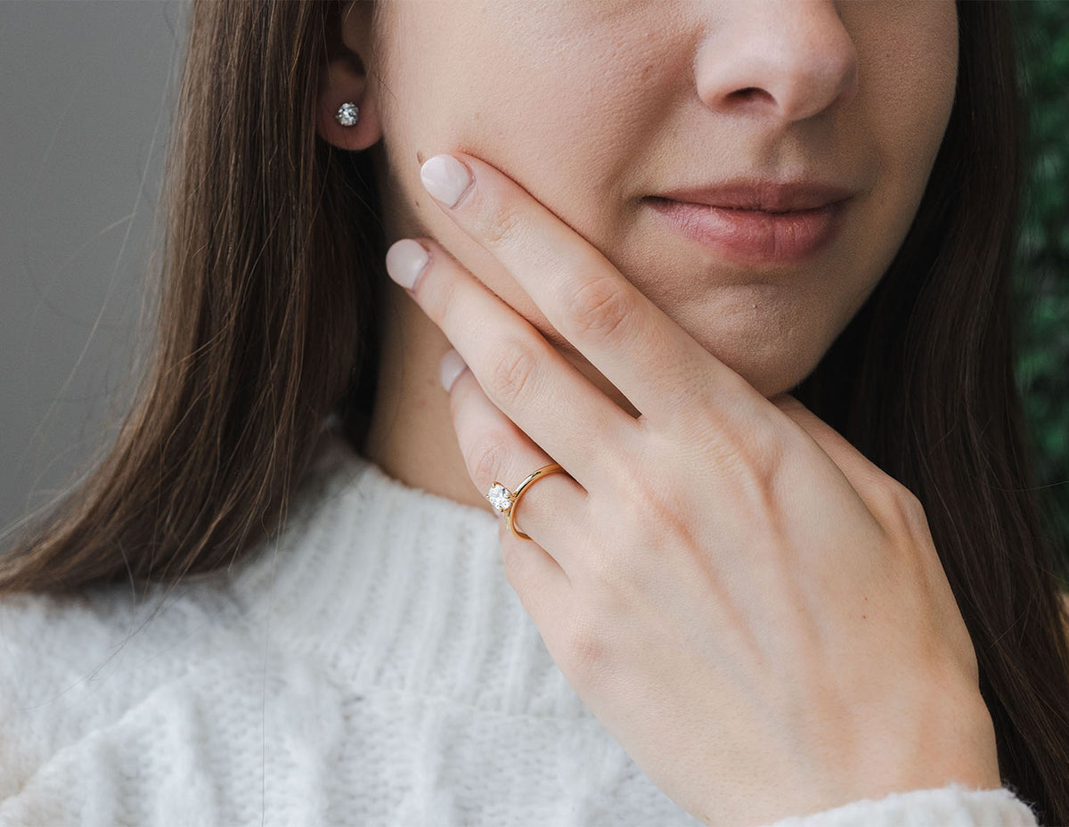 3/4ct. t.w. Oval Cut Newborn Lab Created Diamond Hidden Halo Engagement Ring in 14K Yellow Gold