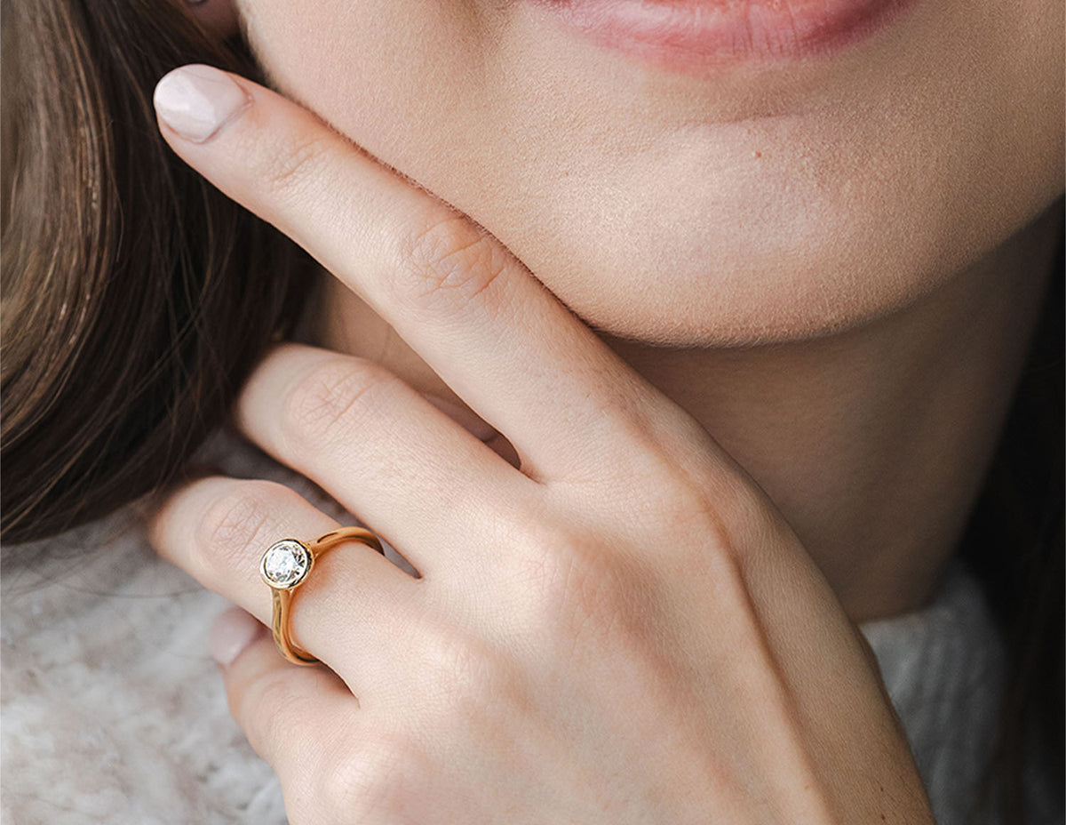 3/4ct. Round Cut Newborn Lab Created Diamond Bezel Engagement Ring in 14K Yellow Gold