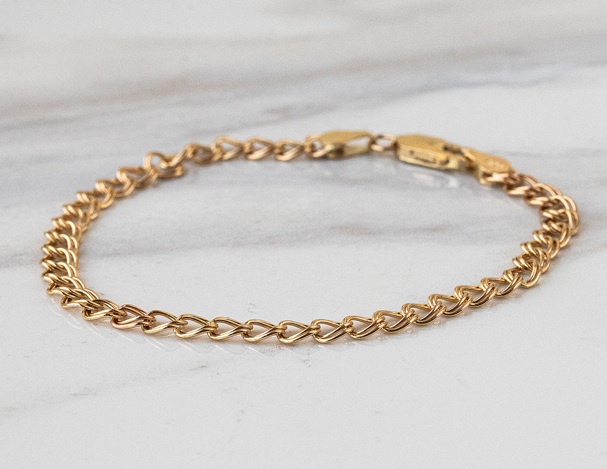 7" Solid Curb Charm Bracelet in 14K Yellow Gold