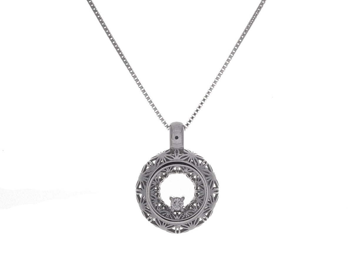 1/14ct. Diamond Puffed Pendant in Sterling Silver