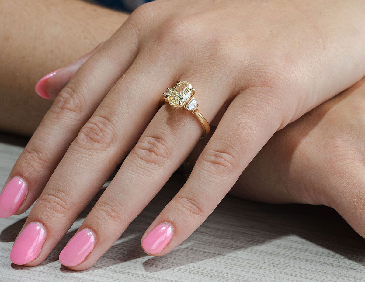 2 1/2ct. t.w. Yellow Oval Cut Newborn Lab Created Diamond Engagement Ring in 14K Yellow Gold