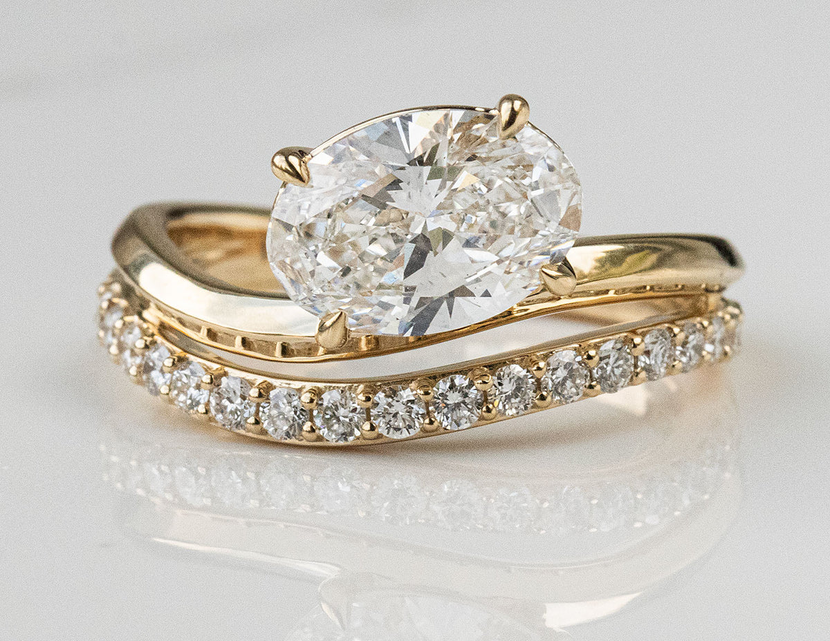 2 1/3ct. t.w. Oval Cut Newborn Lab Created Diamond Engagement Ring in 14K Yellow Gold