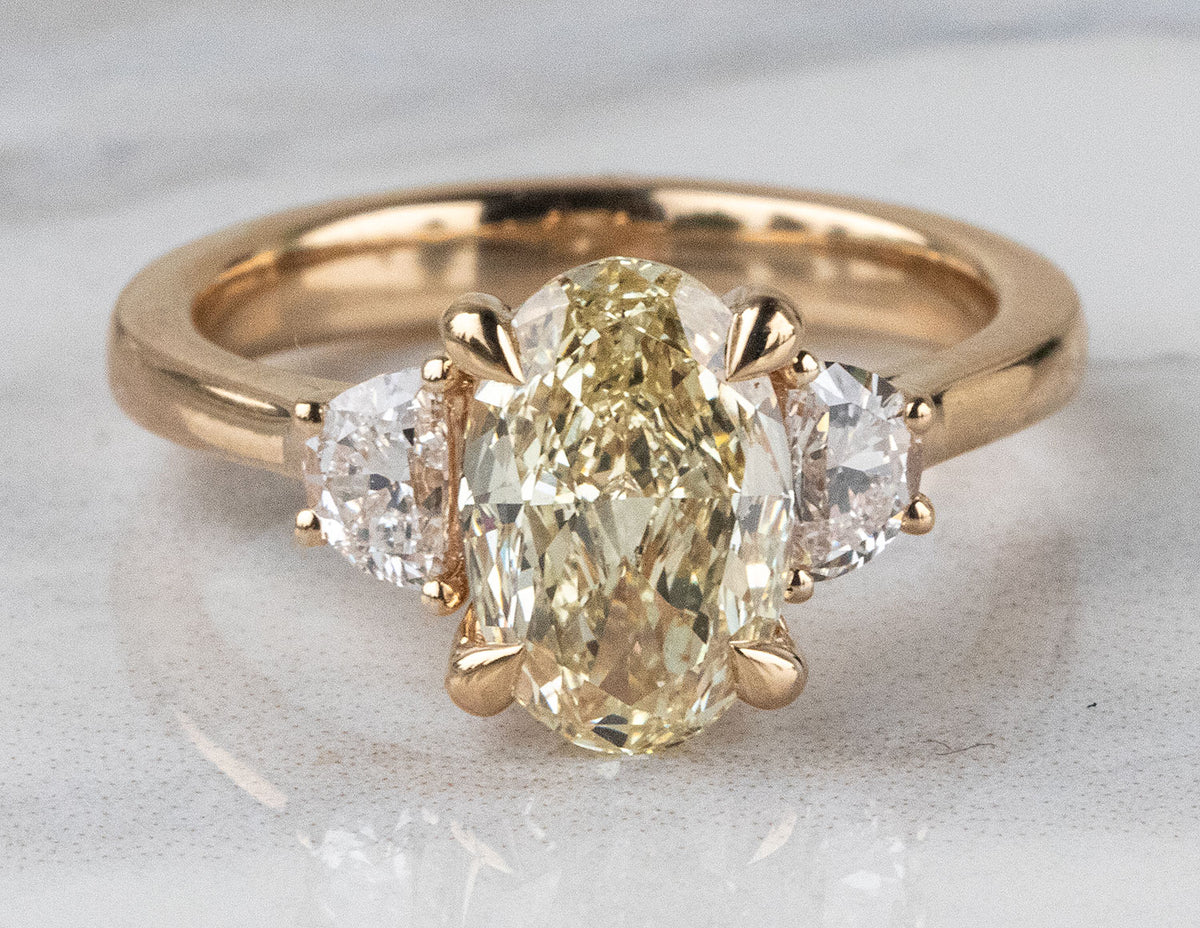 2 1/2ct. t.w. Yellow Oval Cut Newborn Lab Created Diamond Engagement Ring in 14K Yellow Gold