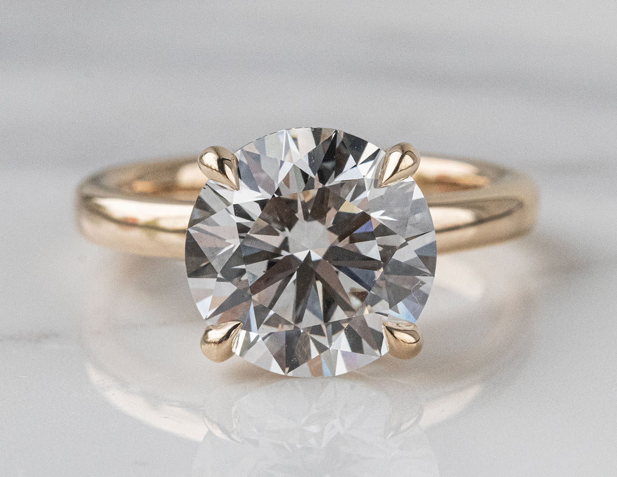 5ct. Round Cut Newborn Lab Created Diamond Solitaire Engagement Ring in 14K Yellow Gold