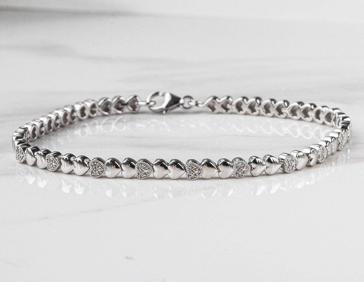 1/7ct. t.w. Diamond Heart Bracelet in Sterling Silver