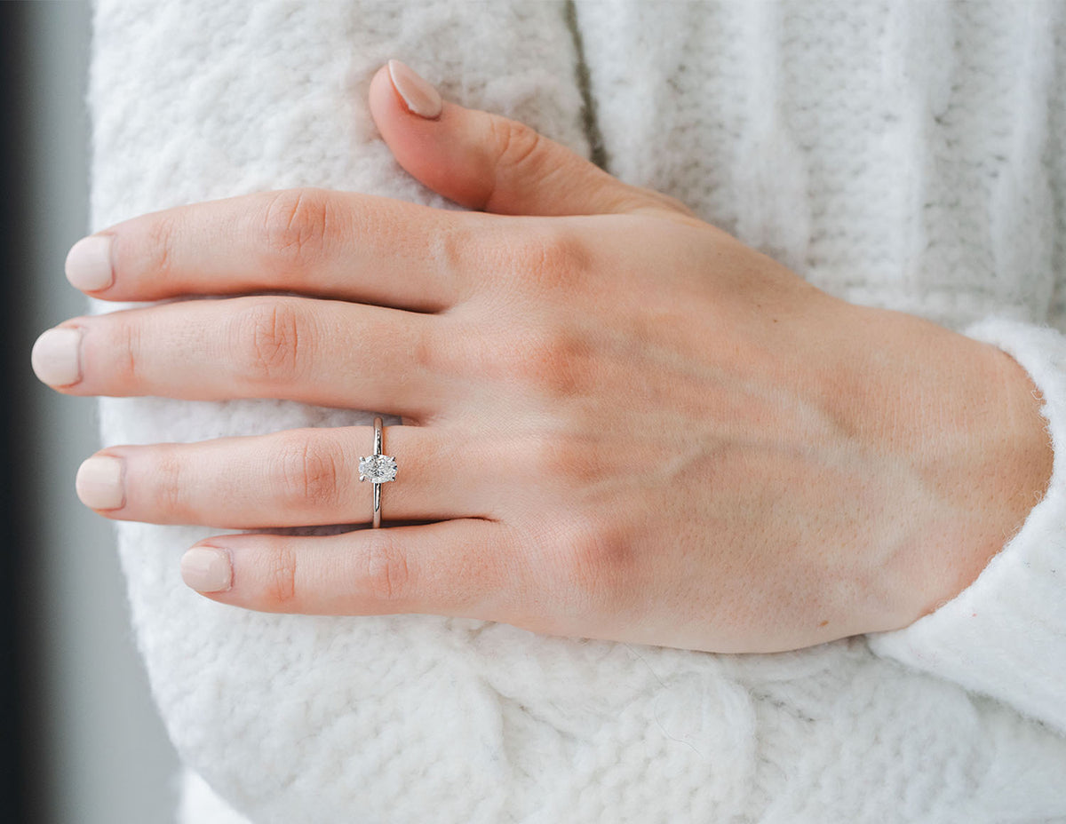3/4ct. t.w. Oval Cut Newborn Lab Created Diamond Hidden Halo Engagement Ring in 14K White Gold