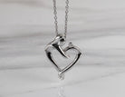 .01ct. Diamond Pendant in Sterling Silver