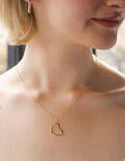 .01ct. Diamond Open Heart Pendant in 14K Yellow Gold