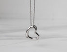 .01ct. Diamond Heart Pendant in Sterling Silver