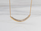 1/10ct. t.w. Diamond Curved Bar Pendant in 14K Yellow Gold