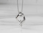 .03ct. Diamond Mother's Pendant in Sterling Silver