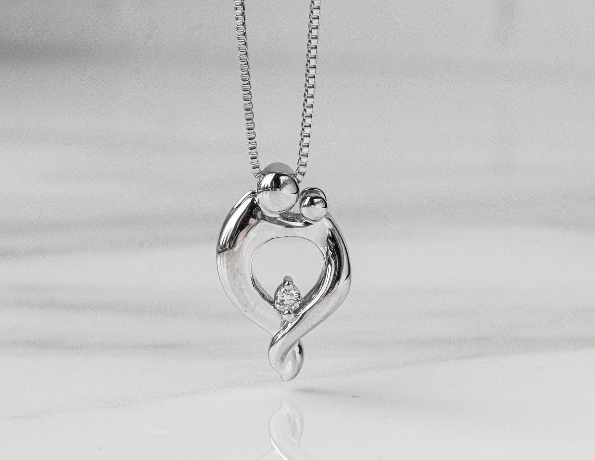 .03ct. Diamond Mother's Pendant in Sterling Silver