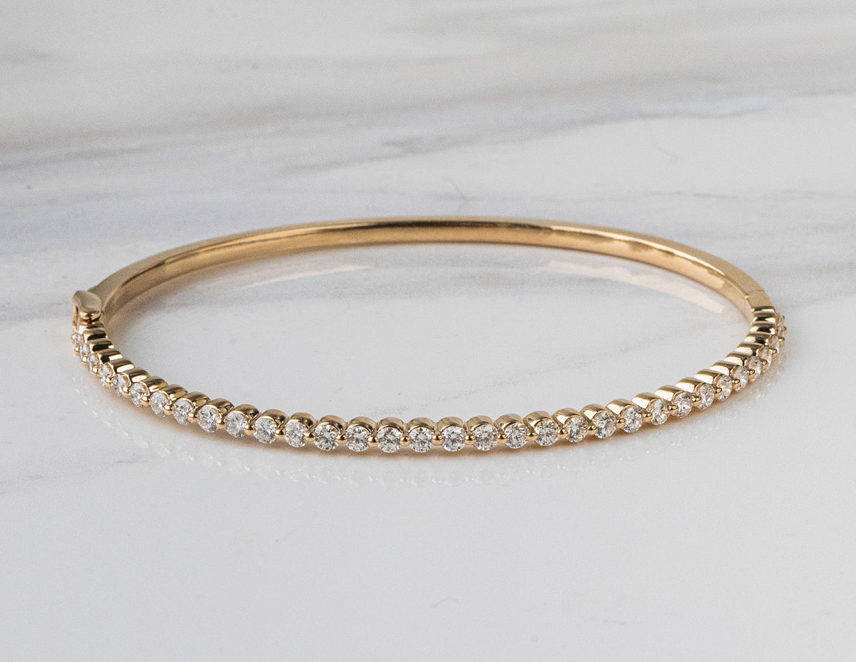 1 1/2ct. t.w. Diamond Bangle Bracelet in 14K Yellow Gold
