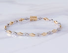 1/3ct. t.w. Diamond Fashion Bracelet in 14K Yellow and White Gold