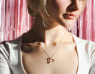 1/10ct. t.w. Diamond Journey Heart Pendant in Sterling Silver