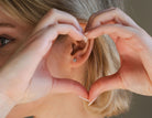 1/10ct. t.w. Diamond Heart Earrings in 10K White Gold