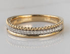 1/8ct. t.w. Diamond Anniversary Ring in 14K Yellow and White Gold