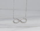 1/4ct. t.w. Diamond Infinity Pendant in 14K White Gold