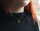 18" Gold Ion-Plated Stainless Steel Cursive Initial "M" Pendant