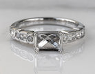 1/2ct. t.w. Emerald and Round Cut Diamond Engagement Ring in 14K White Gold