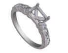 1/2ct. t.w. Emerald and Round Cut Diamond Engagement Ring in 14K White Gold