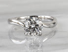 1 1/2ct. Round Cut Newborn Lab Created Diamond Twist Solitaire Engagement Ring in 14K White Gold
