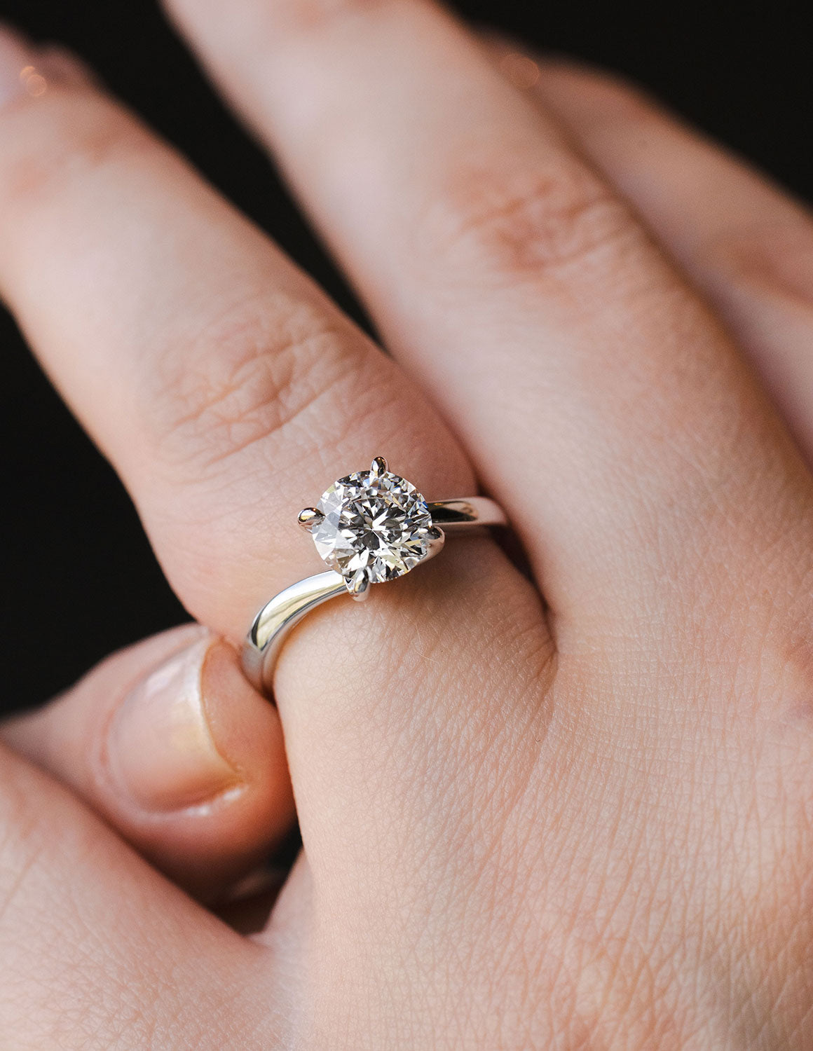 1 1/2ct. Round Cut Newborn Lab Created Diamond Twist Solitaire Engagement Ring in 14K White Goldvvvvv
