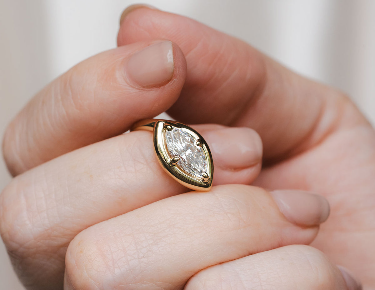 1 1/2ct. Marquise Cut Newborn Lab Created Diamond East-West Engagement Ring in 14K Yellow Gold