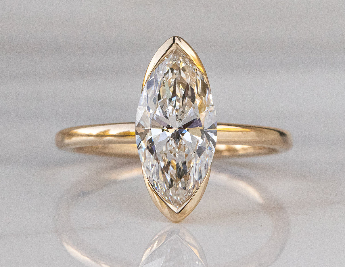 2ct. Marquise Cut Newborn Lab Created Half-Bezel Solitaire Diamond Engagement Ring in 14K Yellow Gold
