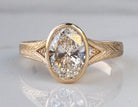 2 1/4ct. t.w. Oval Cut Newborn Lab Created Bezel Diamond Engagement Ring in 14K Yellow Gold