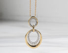 1/4ct. t.w. Diamond Oval Drop Pendant in 14K Yellow Gold and Platinum