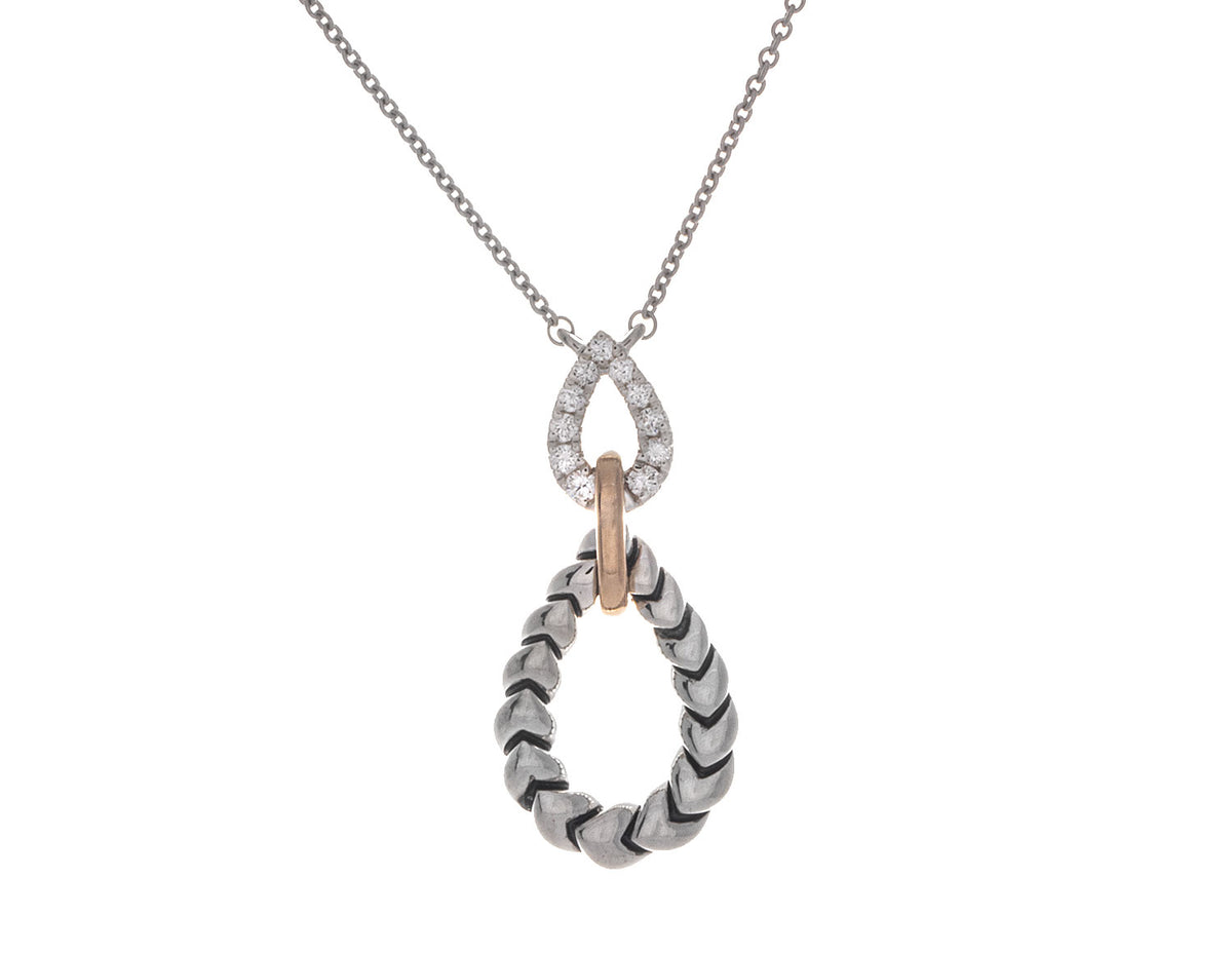 1/7ct. t.w. Diamond Drop Pendant in 14K Yellow Gold and Sterling Silver