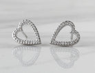 1/5ct. t.w. Diamond Heart Earrings in Sterling Silver