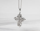 .05ct. t.w. Diamond Cross Pendant in Sterling Silver