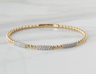 1/2ct. t.w. Diamond Flexie Bangle Bracelet in 14K Yellow and White Gold