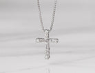 1/10ct. t.w. Diamond Cross Pendant in Sterling Silver