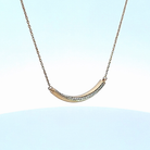 1/10ct. t.w. Diamond Curved Bar Pendant in 14K Yellow Gold