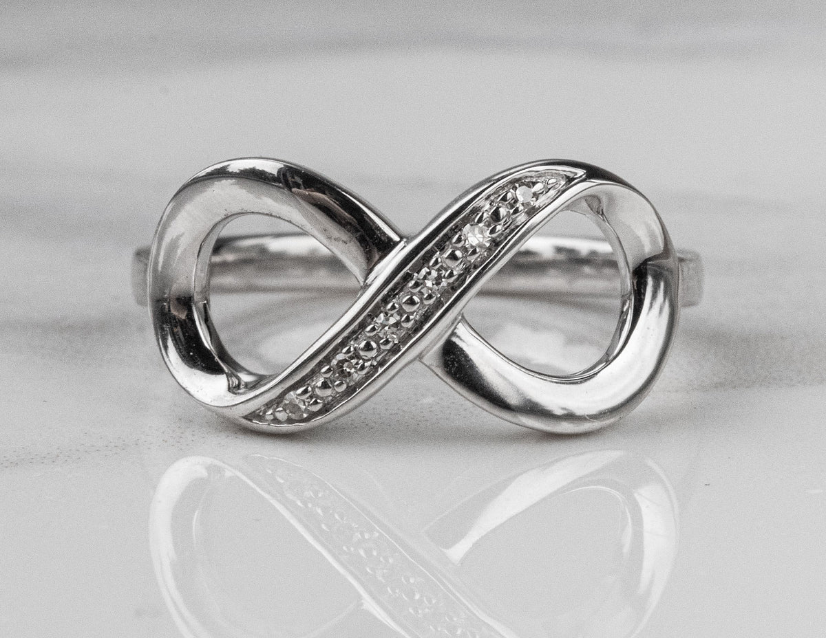 .03ct. t.w. Diamond Infinity Promise Ring in Sterling Silver