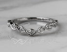 1/7ct. t.w. Curved Diamond Wedding Ring in 14K White Gold