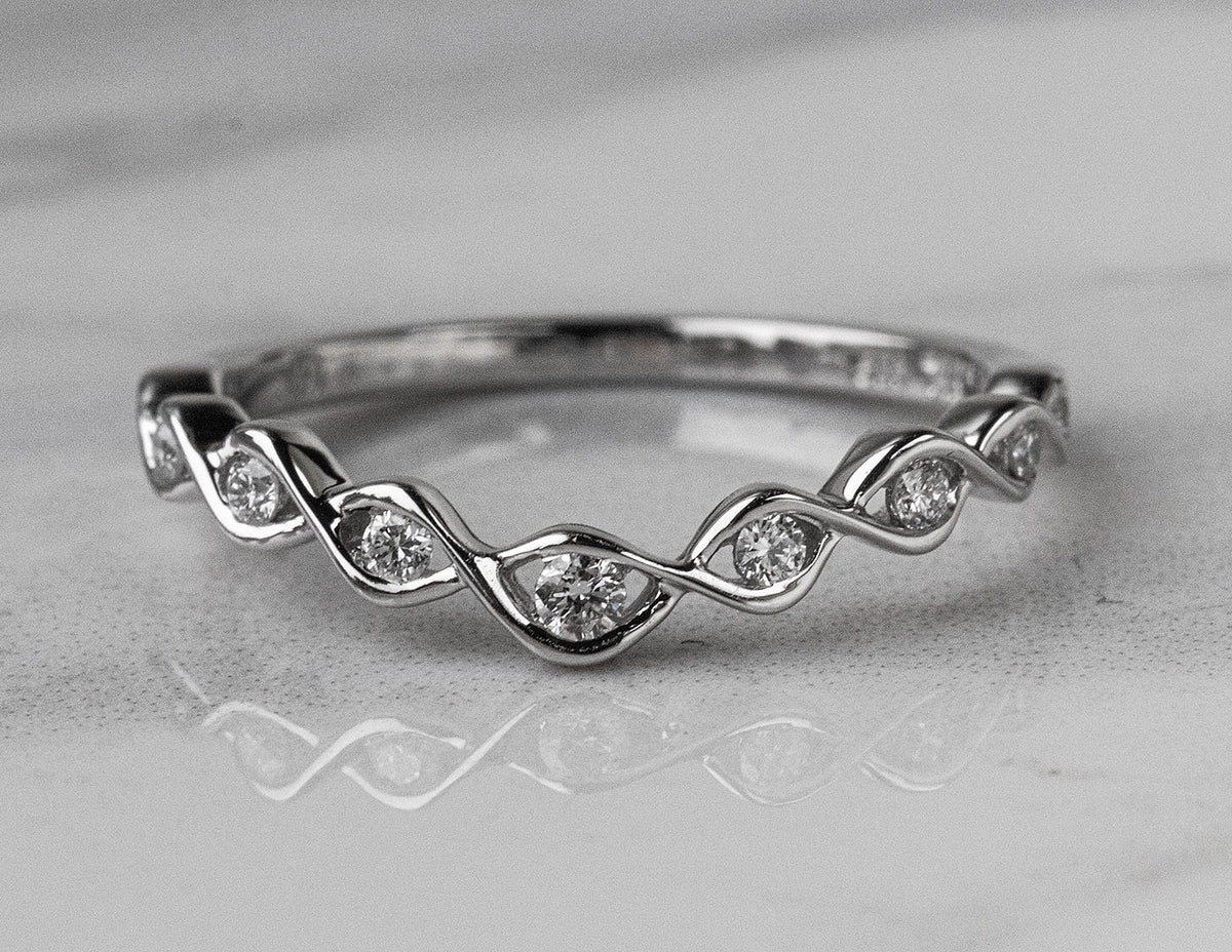 1/7ct. t.w. Curved Diamond Wedding Ring in 14K White Gold